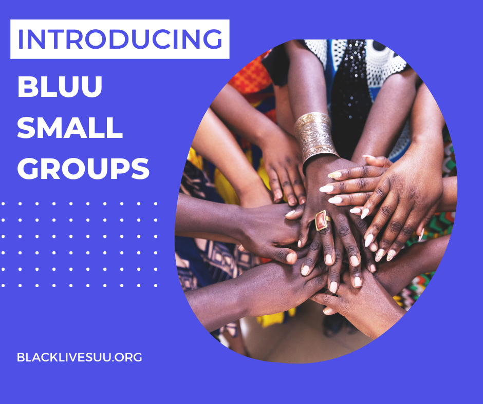 Group of Black people stacking hands.